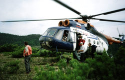 ‘MI 8’      MI-8 Helicopter lands at porphyry copper prospect with PRGCI President Tom Bundtzen in Russian Far East; circa June, 2007